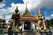 Bangkok Wat Arun - The entrance of the ubosot guarded by a pair of giant demons.